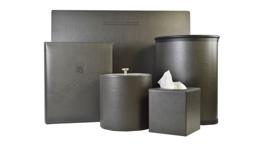 custom hotel room supplies includes desk blotter, ice bucket, tissue holder, wastebasket and guest room directory